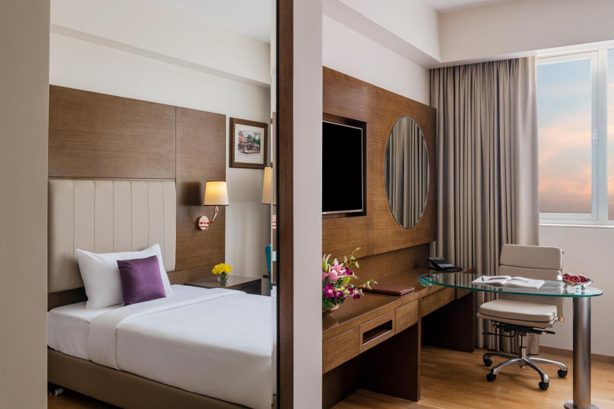 Vivanta Тривандрум Экстерьер фото A room at the hotel